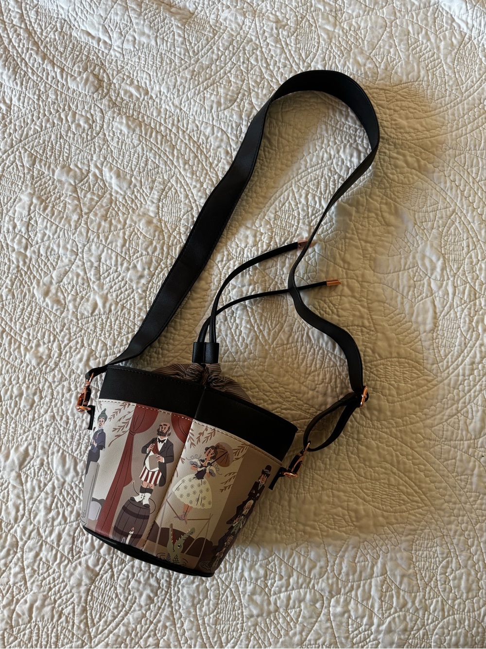 Women's Printed Bucket Crossbody Bag in Black and Multicolor